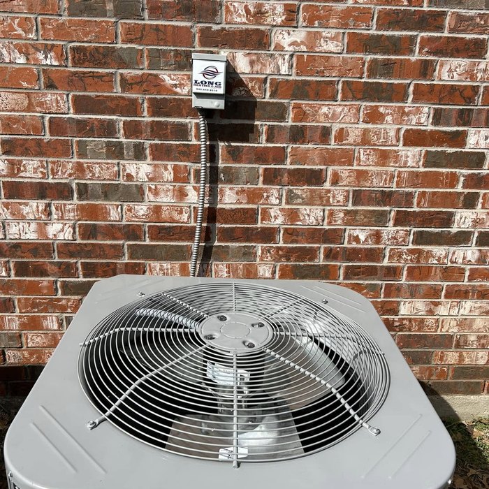 AC condenser install on brick home